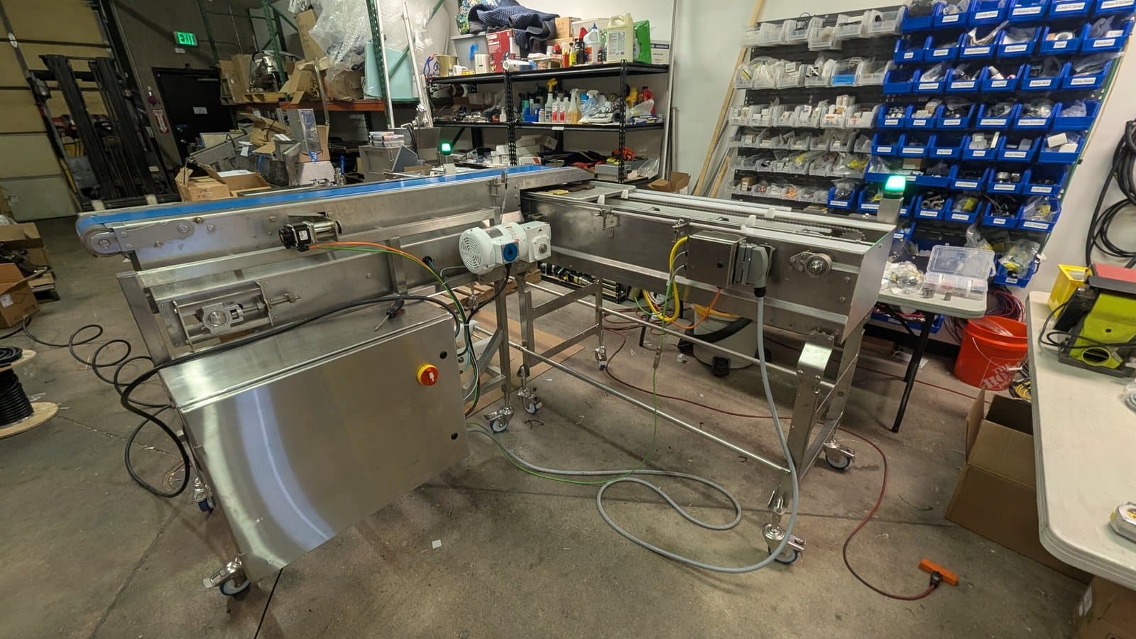 Conveyor subassembly under construction in the shop, drives mounted and E-stop fitted